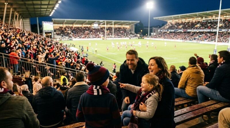 enfants et parents dans les tribunes d'un stade de rugby le soir